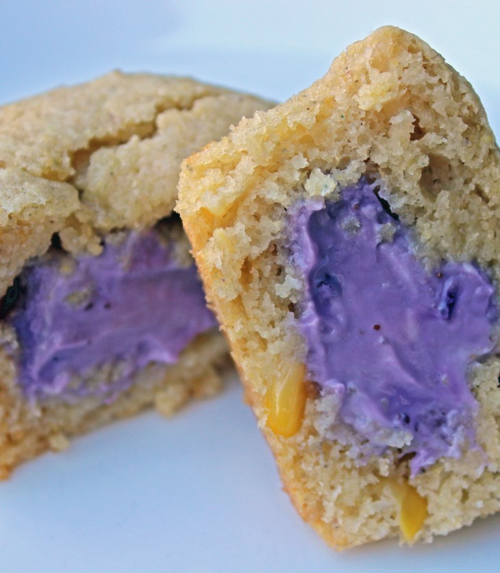 Cornbread style muffins contain a sweet surprise with blueberry cream cheese filling